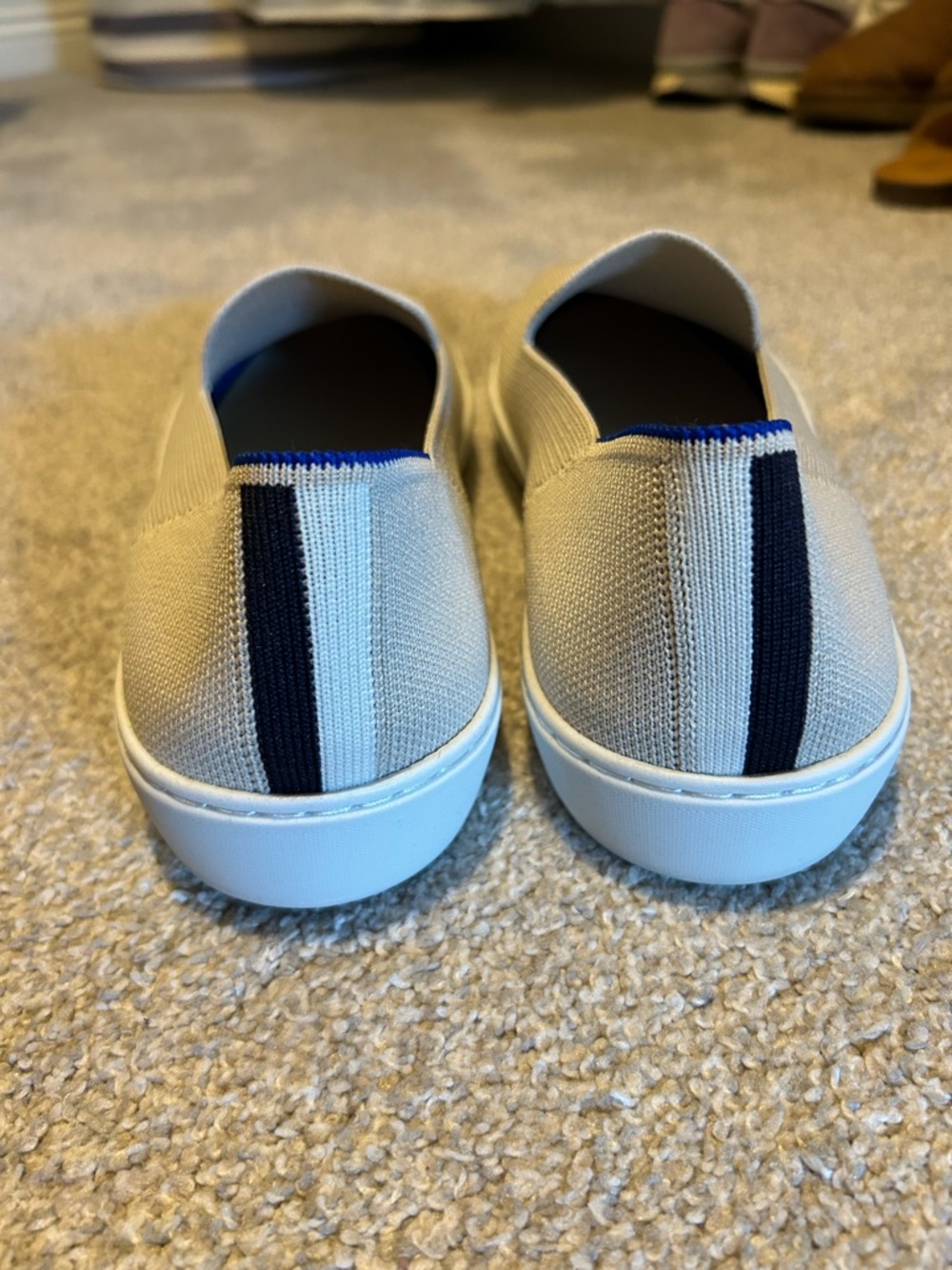 Rothy's Beige Knit Slip-On Sneakers with Navy Heel Stripe